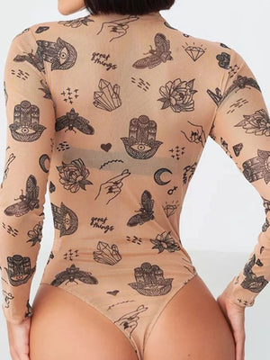 Sheer bodysuit with black tattoo-like patterns on a white background