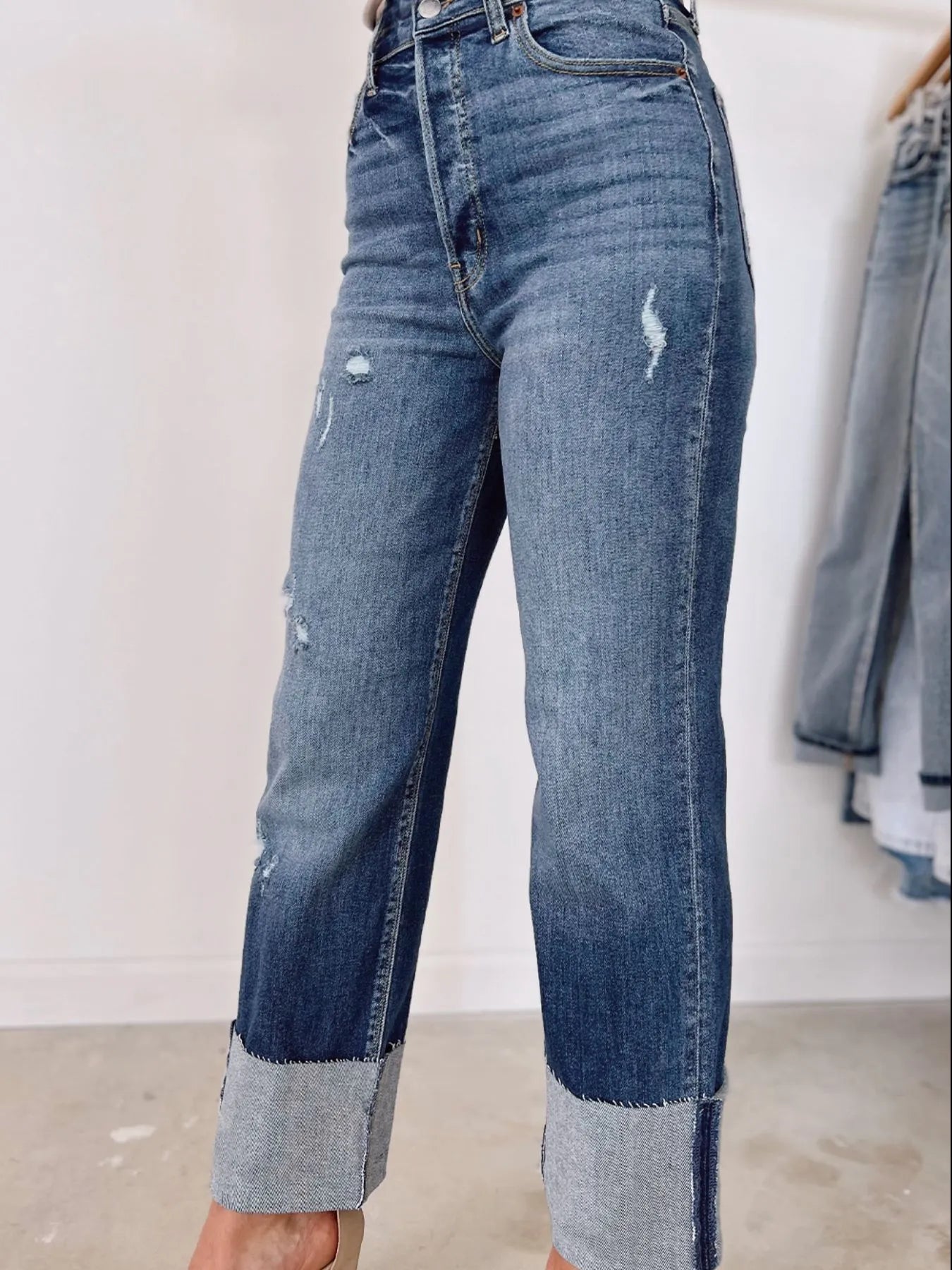 Blue jeans with a white background