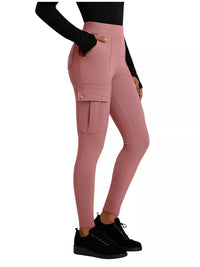 Pink leggings worn by a person on a white background