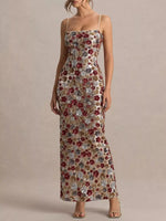 Woman wearing a floral dress against a beige background