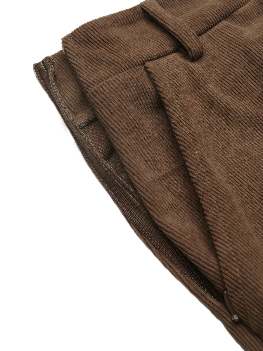 Brown ribbed knit sweater on a white background