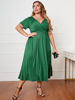 Front view of green Honey Plus Size Short Sleeve Surplice Neck Midi Dress