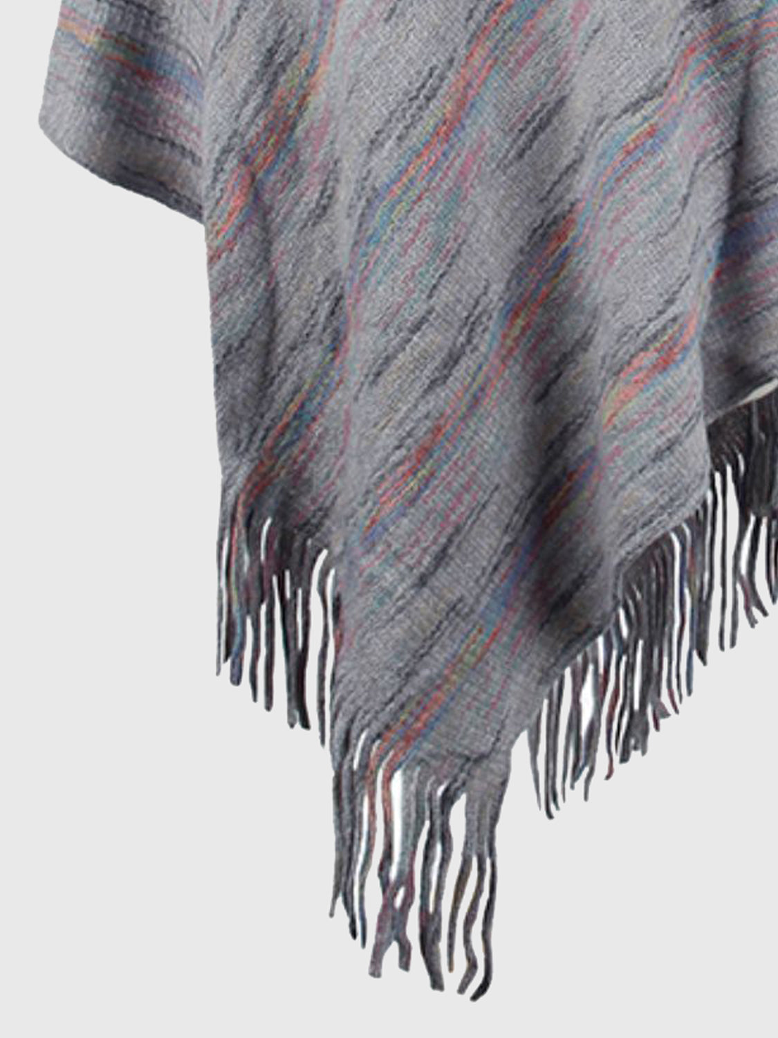 Gray poncho with multicolor pattern and fringes on a white background
