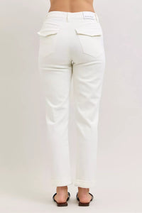 White jeans on a plain background