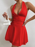 Red dress worn by a person against a white background
