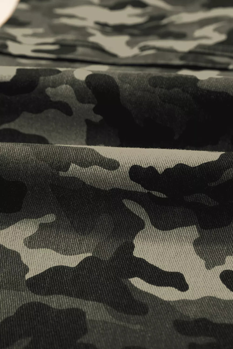 Close-up of camouflage fabric with black and gray pattern