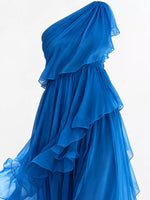 A zoom in view of blue One-Shoulder Ruffled Chiffon Maxi Dress on a white background