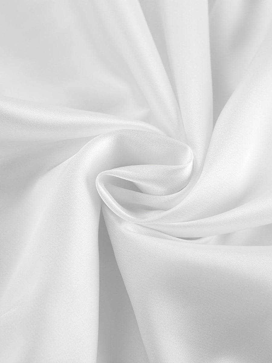 Close-up of white fabric with folds