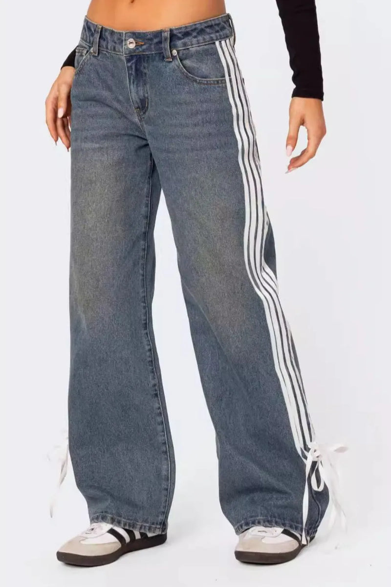 Blue jeans with white stripes on a white background