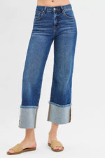 Blue jeans with a white background