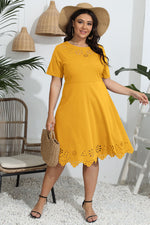 Woman wearing a yellow dress with a hat indoors