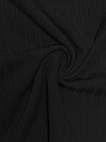 Black textured fabric with folds