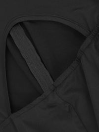 Close-up of a black garment with a criss-cross design.