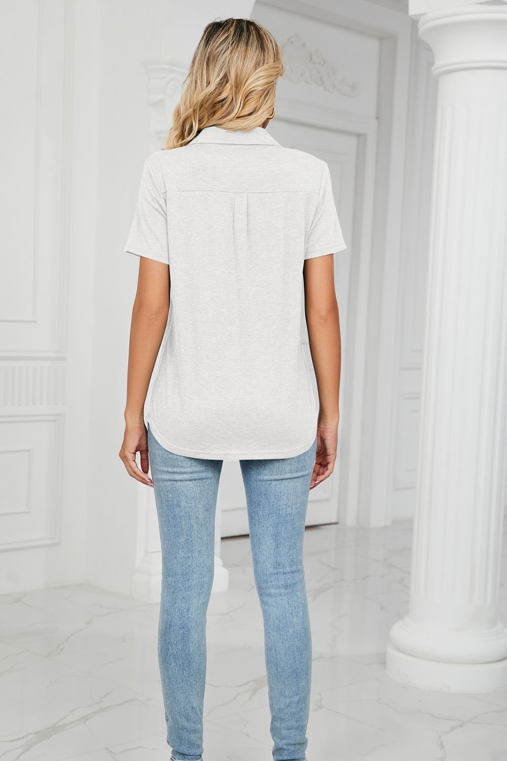 Back view of white Curved Hem Johnny Collar Polo Shirt