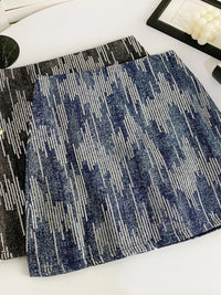 Two textured placemats with geometric patterns on a white surface.