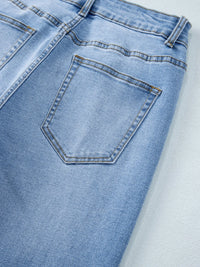 Close-up of a blue denim pocket on jeans.