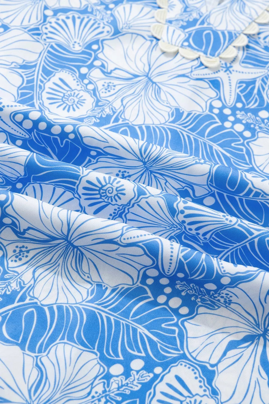Blue and white floral fabric pattern