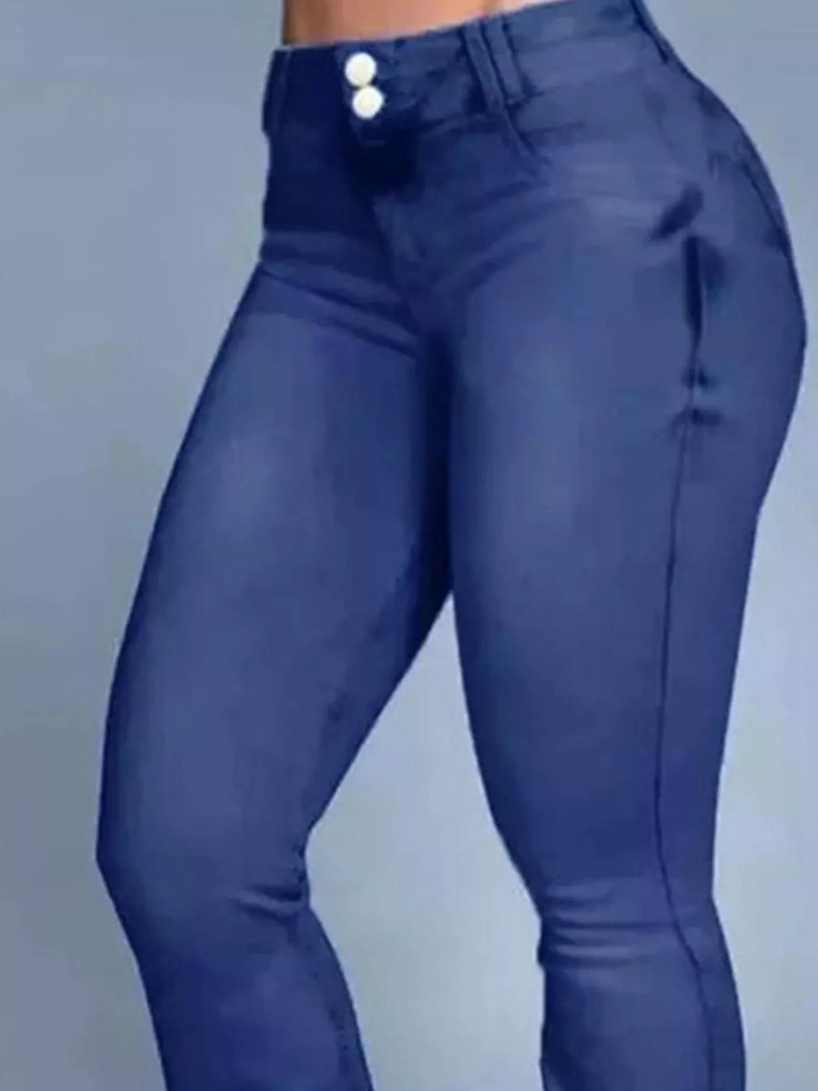 Blue jeans on a plain background