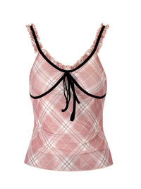 Pink plaid tank top with black trim on a white background