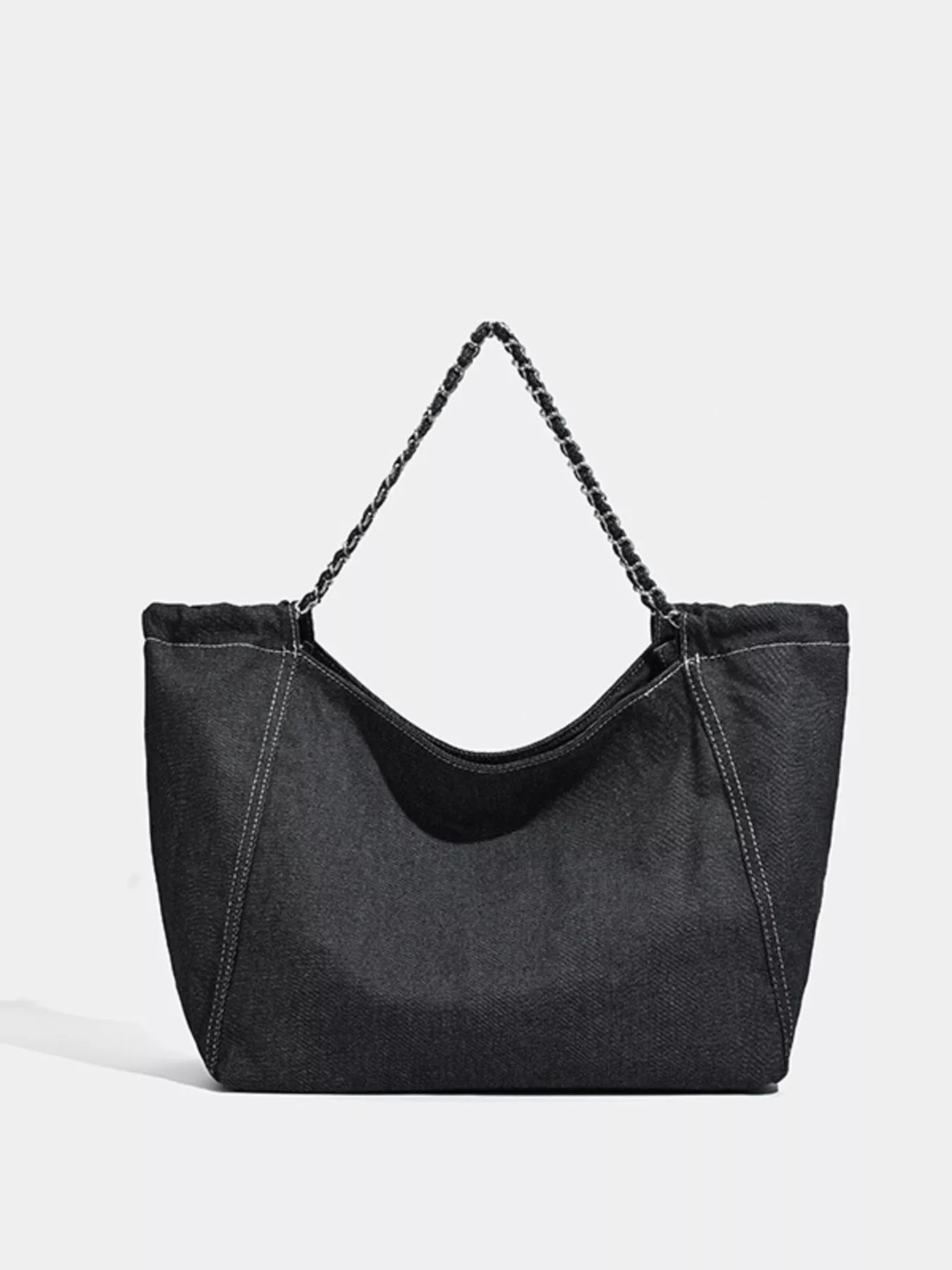 Black handbag with a chain strap on a light gray background