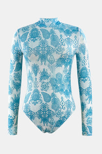 Blue and white patterned leotard on a white background
