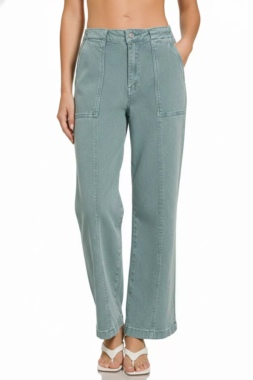 Light blue jeans worn by a person on a white background