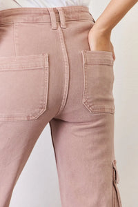 Close-up of pink pants with a plain background