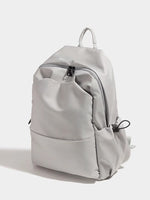 Light gray backpack on a white background
