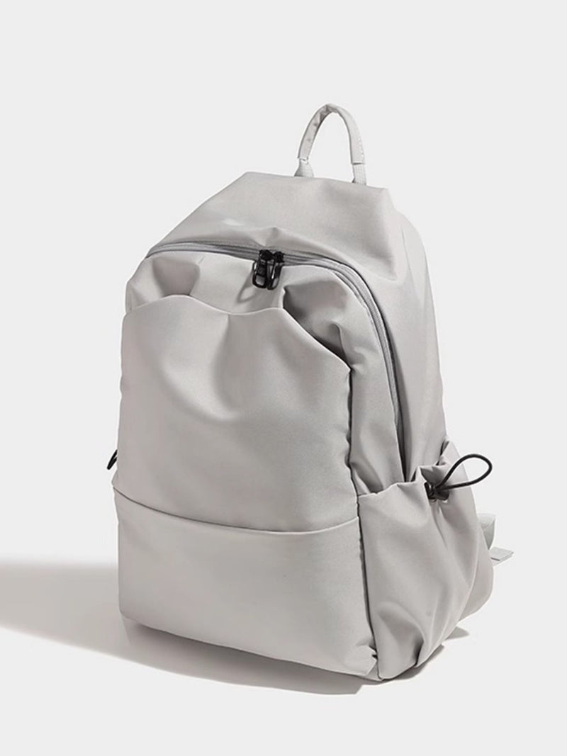 Light gray backpack on a white background