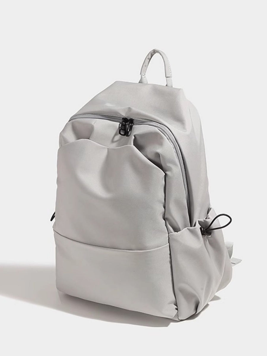 Light gray backpack on a white background
