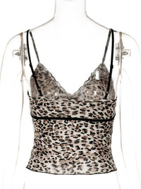 Leopard print top on a mannequin with a white background