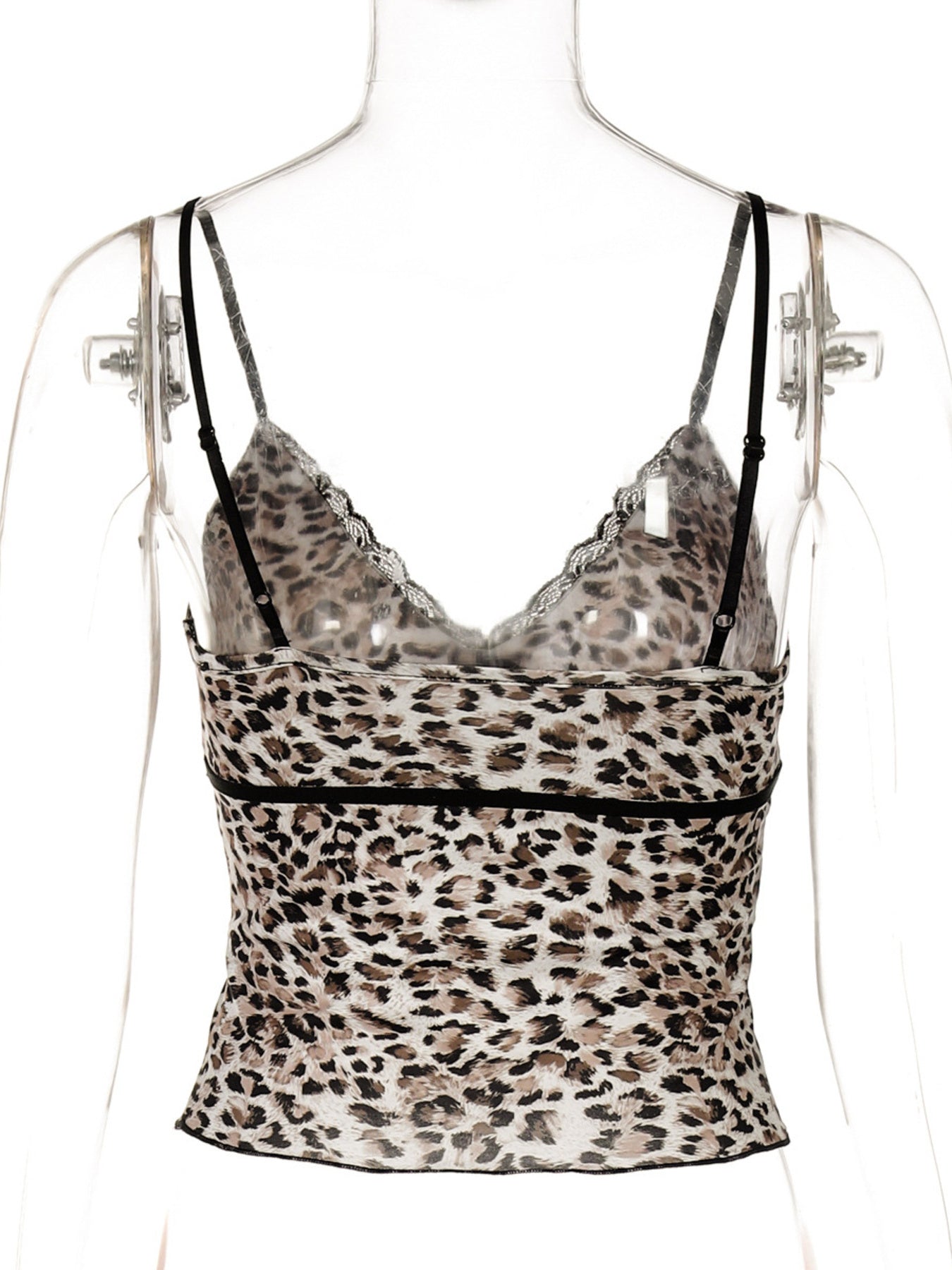 Leopard print top on a mannequin with a white background