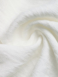 Close-up of white fabric with a soft texture