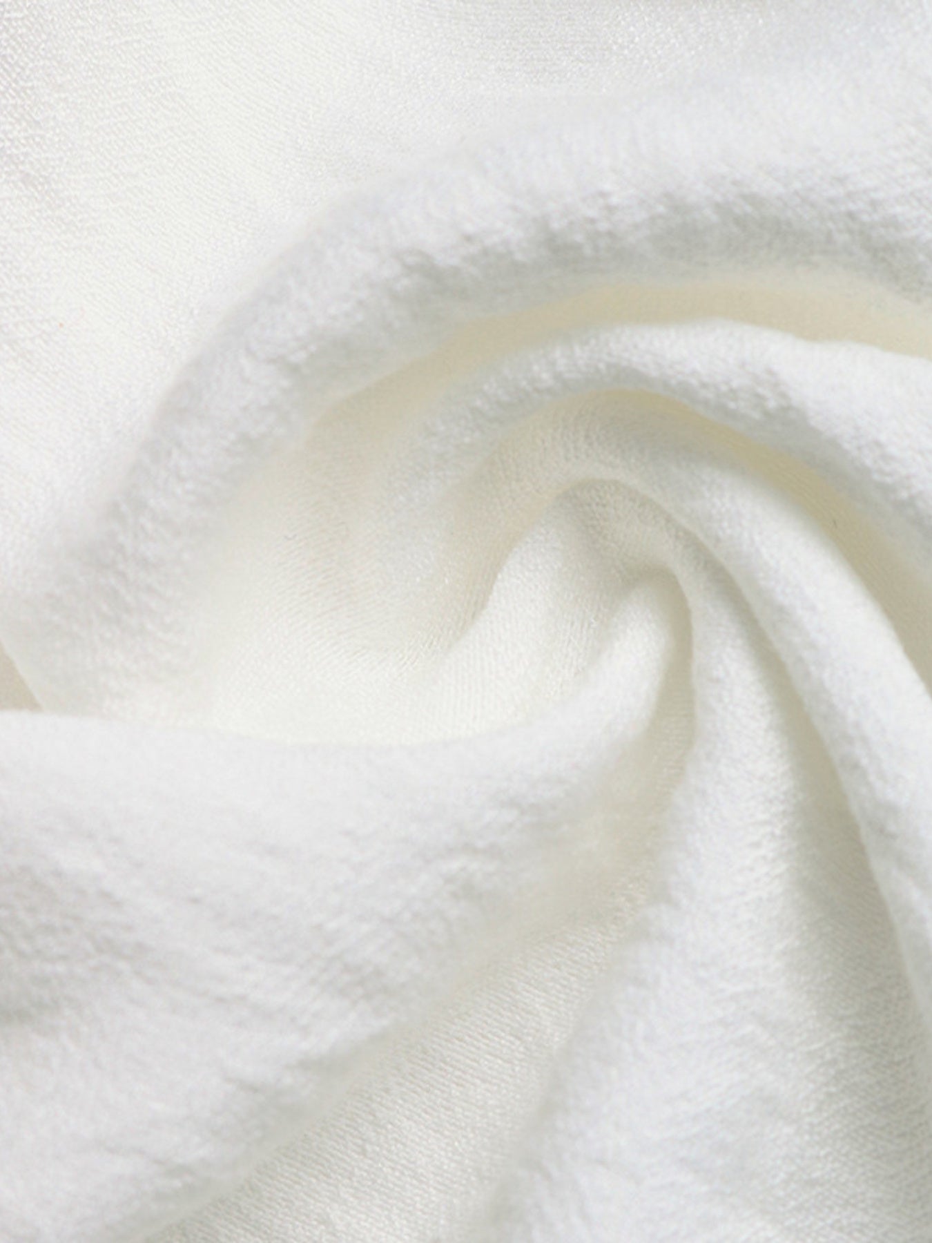 Close-up of white fabric with a soft texture
