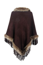 Brown poncho with fur trim on a white background