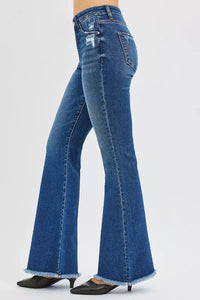 Blue flared jeans on a white background