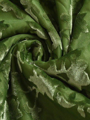 Close-up of green fabric with a subtle pattern