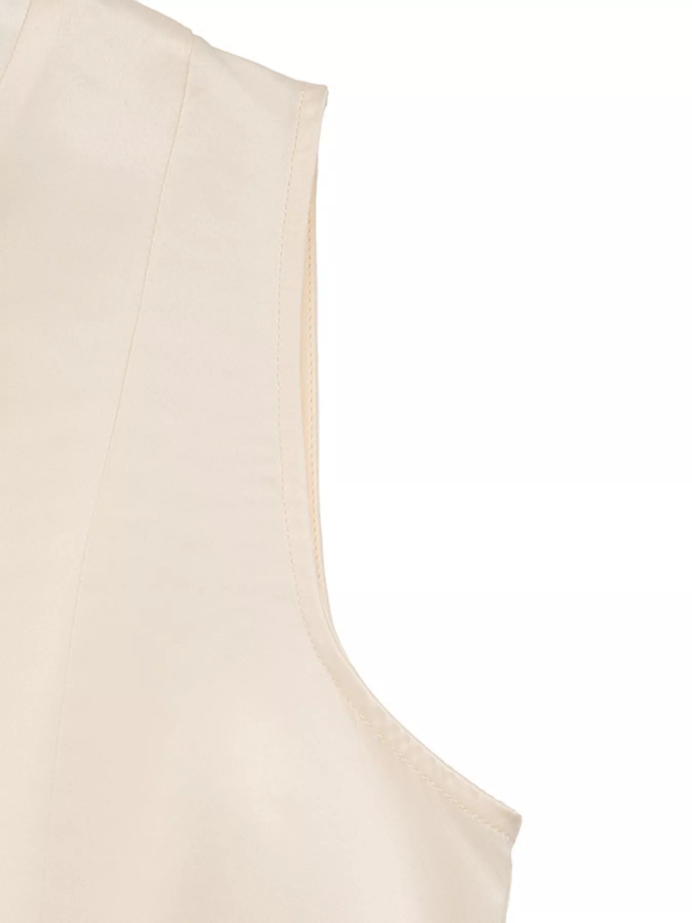 Beige sleeveless top on a white background