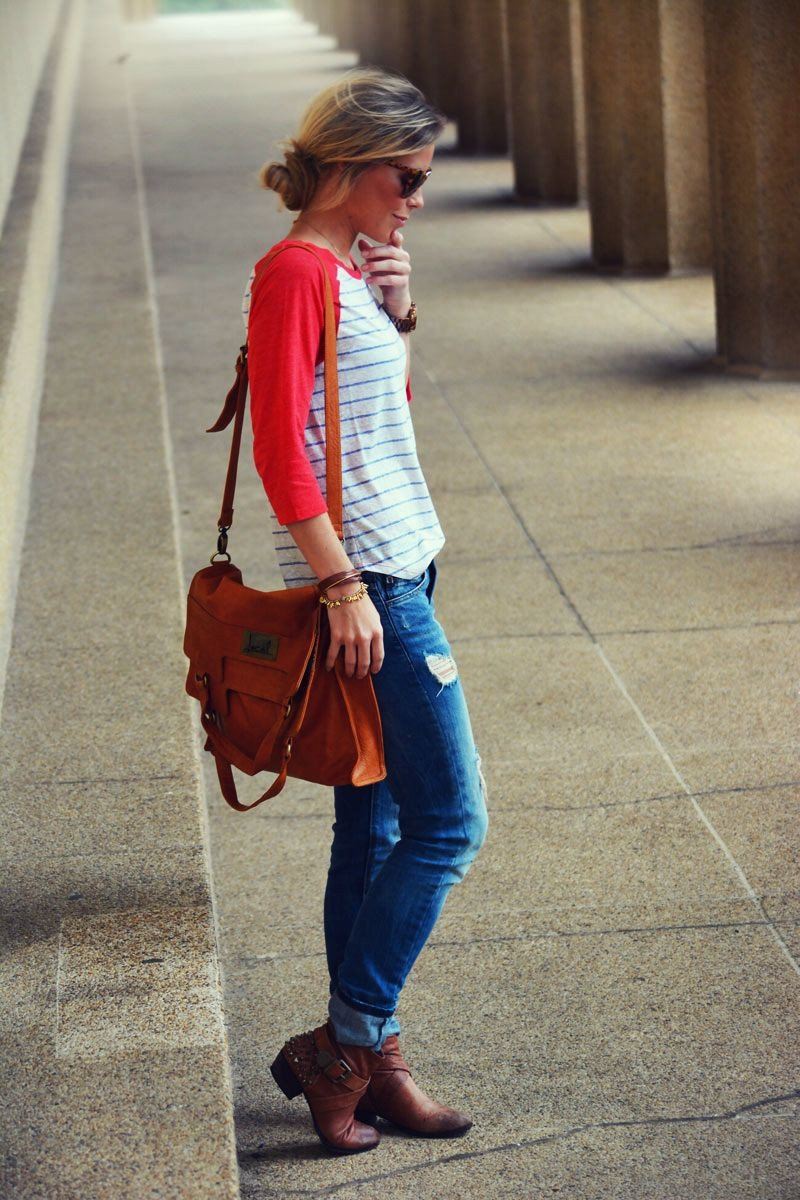 Woman standing on a sidewalk wearing Mi Vida Foldover Tote