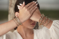 woman showing many Harrison Bracelet  on her wrist 