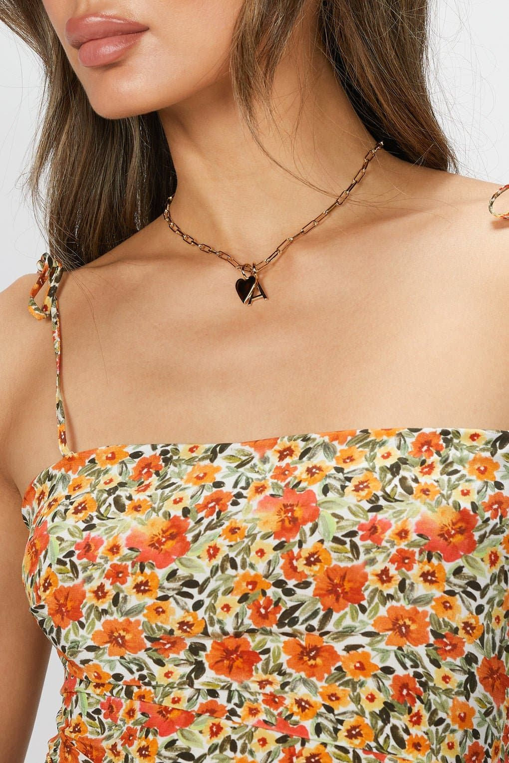 Woman wearing Helena Charm Necklace