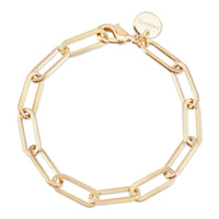 A gold-colored large elongated link chain bracelet with a shiny finish and a clasp.