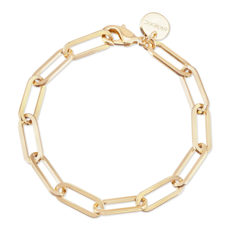 A gold-colored large elongated link chain bracelet with a shiny finish and a clasp.