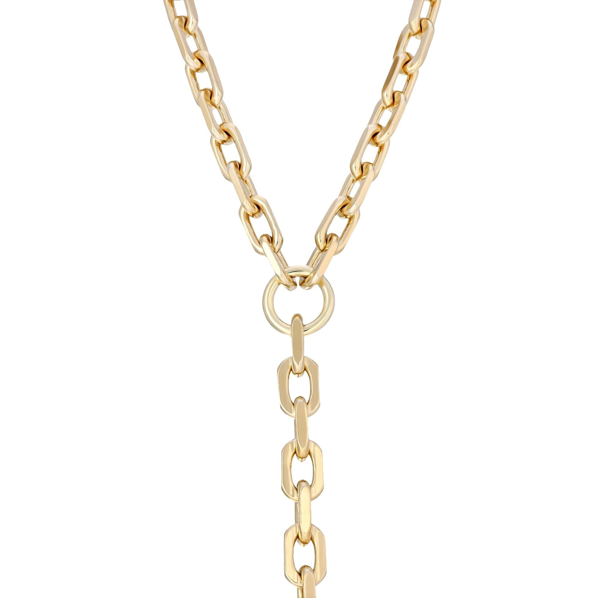 A gold-colored lariat necklace made with a thick recycled brass cable link chain, featuring a bold clasp and minimalist design.