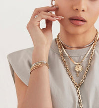 Woman wearing layered Lennon Lariat Necklace