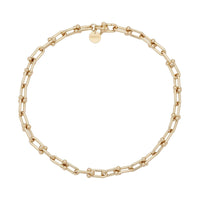 A gold-colored U-link chain necklace with a distinctive clasp.