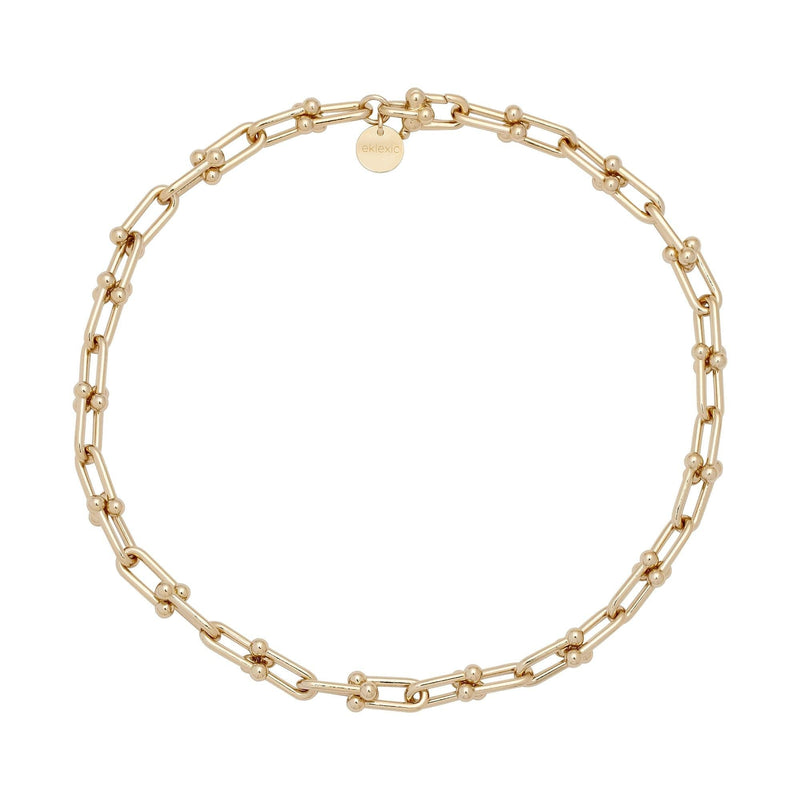 A gold-colored U-link chain necklace with a distinctive clasp.