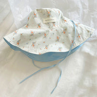 Marigold Shadows Accessories Supinet Reversible Bucket Hat