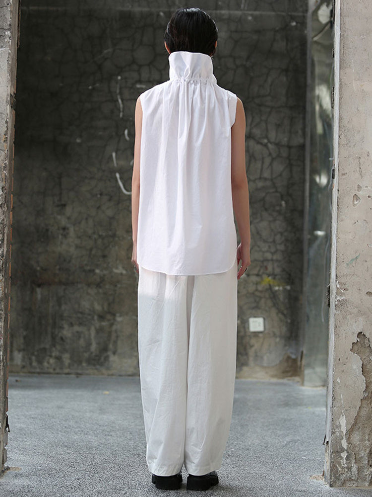 Back view of white short sleeve blouse