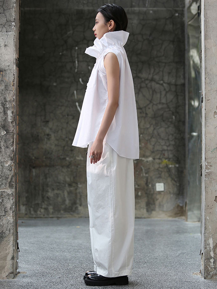 Side view of white short sleeve blouse